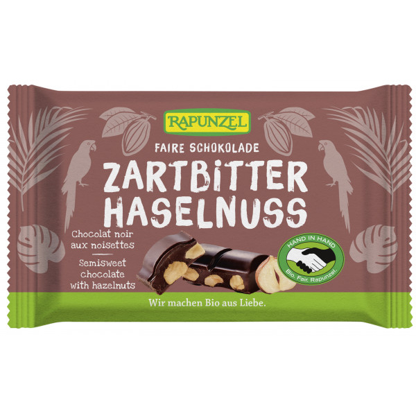 Rapunzel Zartbitter Schokolade mit ganzen Haselnüssen, BIO, 100g - MHD 12.02.24